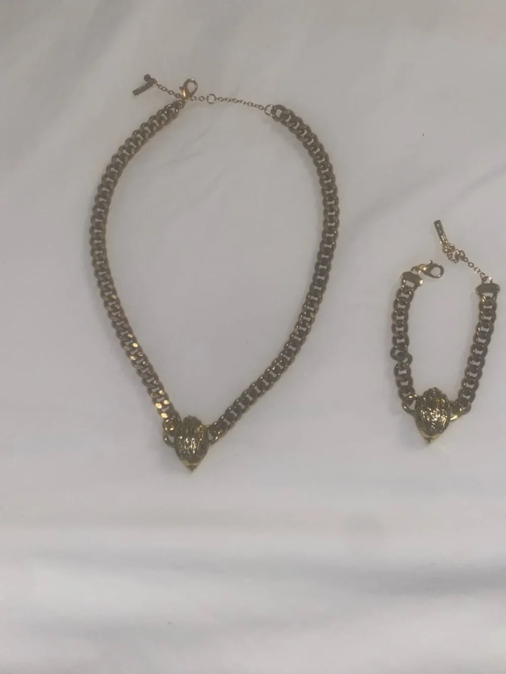 Kurt Geiger Gold and Black Chunky Chain Necklace with Shell Accent